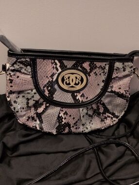 Sharif Pink and Black Snake-Print Crossbody with Gold Emblem